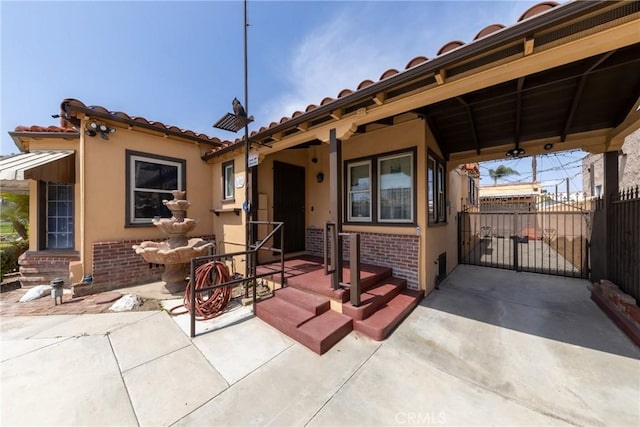 exterior space featuring fence and entry steps