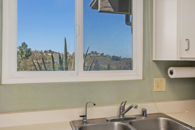 4428 Skimmer Way, Oceanside, CA 92057 - kitchen with a sink and white cabinets