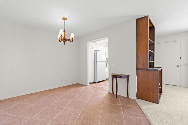 4428 Skimmer Way, Oceanside, CA 92057 - spare room featuring a chandelier and baseboards