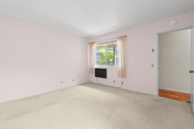 4428 Skimmer Way, Oceanside, CA 92057 - carpeted empty room with a smoke detector and a wall mounted air conditioner
