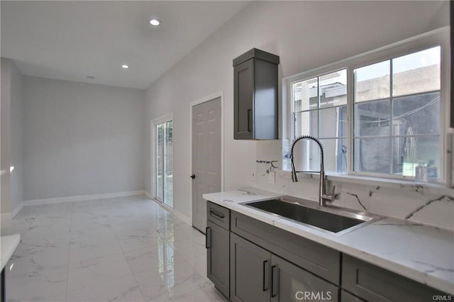 1226212266 Madras Pl, Garden Grove, CA 92840 - kitchen with a sink, baseboards, gray cabinets, light marble finish floors, and recessed lighting