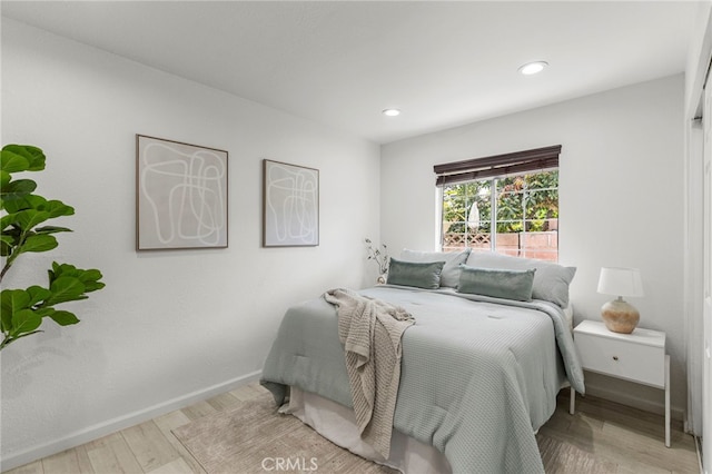 1226212266 Madras Pl, Garden Grove, CA 92840 - bedroom featuring wood finished floors, recessed lighting, and baseboards