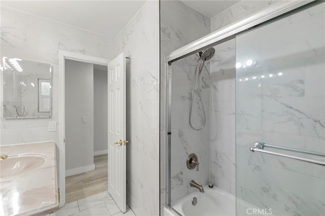 1226212266 Madras Pl, Garden Grove, CA 92840 - full bath featuring bath / shower combo with glass door, vanity, and marble finish flooring