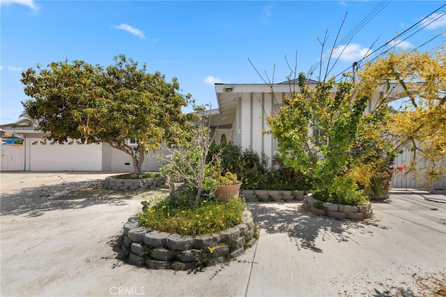 1226212266 Madras Pl, Garden Grove, CA 92840 - view of front facade with stucco siding and a garage