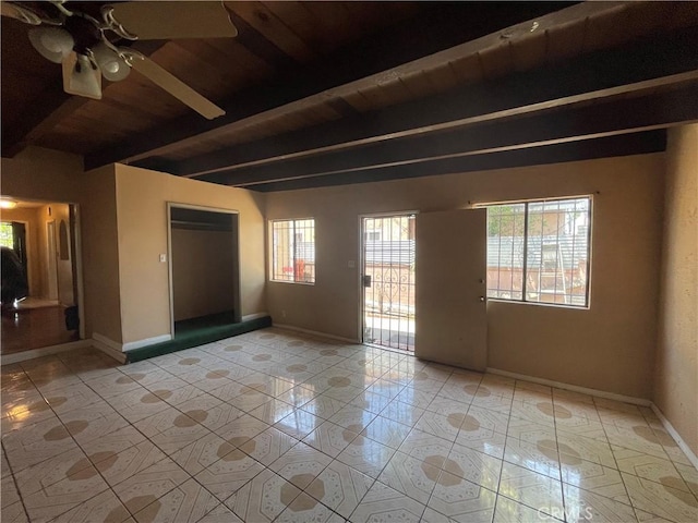 3509 Greenglade Ave, Pico Rivera, CA 90660 - unfurnished room featuring beam ceiling, a ceiling fan, wood ceiling, baseboards, and light tile patterned floors