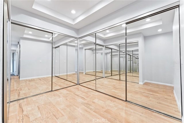 604 Avenida Acapulco, San Clemente, CA 92672 - spacious closet with a raised ceiling and wood finished floors