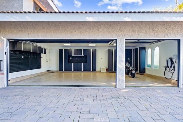 garage with driveway