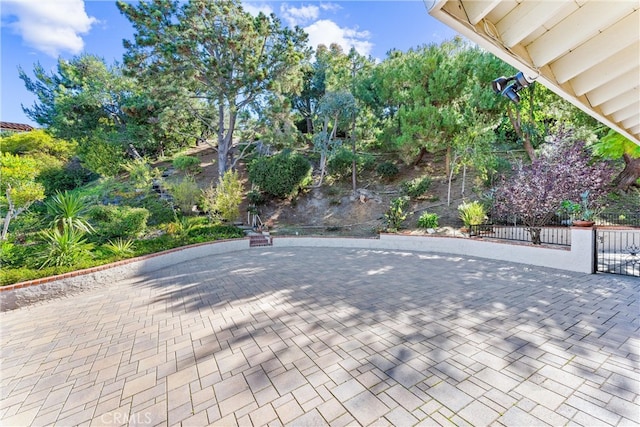 view of patio / terrace featuring fence
