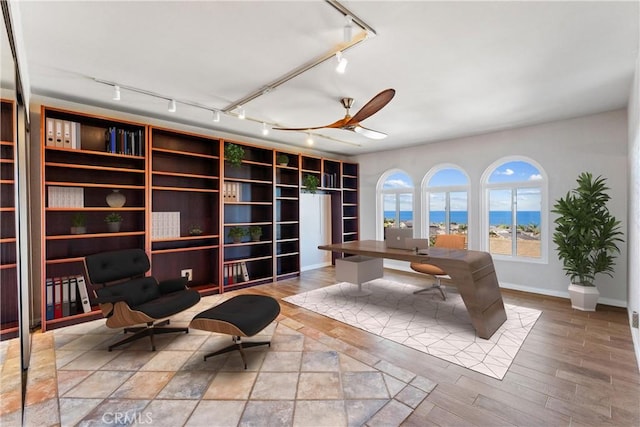 604 Avenida Acapulco, San Clemente, CA 92672 - office with track lighting, baseboards, a ceiling fan, and wood finished floors