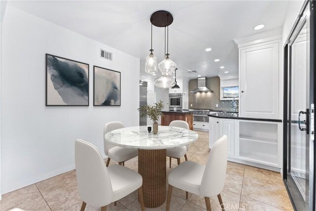 dining room with recessed lighting, baseboards, visible vents, and light tile patterned floors