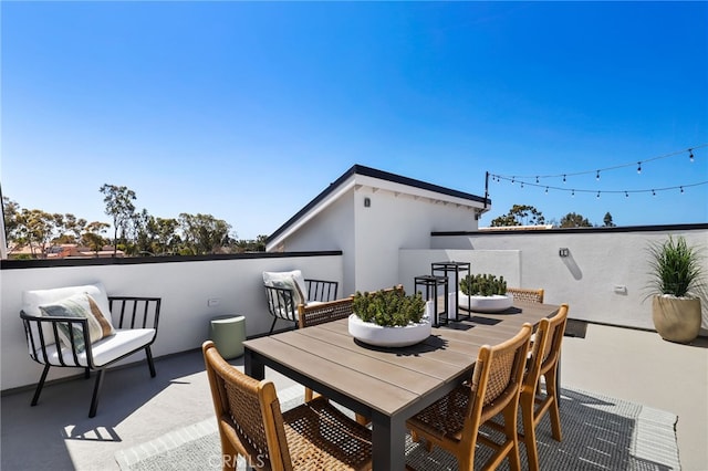19011 Main St Unit 121, Huntington Beach, CA 92648 - view of patio with outdoor dining area