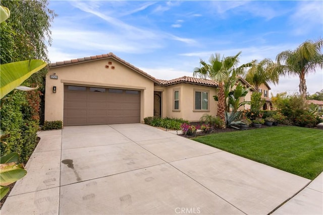 32529 Presidio Hills Ln, Winchester, CA 92596 - mediterranean / spanish house featuring driveway, stucco siding, a garage, a front lawn, and a tile roof