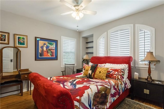 32529 Presidio Hills Ln, Winchester, CA 92596 - bedroom featuring wood finished floors, multiple windows, baseboards, and ceiling fan
