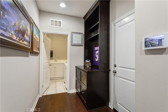 32529 Presidio Hills Ln, Winchester, CA 92596 - corridor featuring a sink, wood finished floors, and recessed lighting