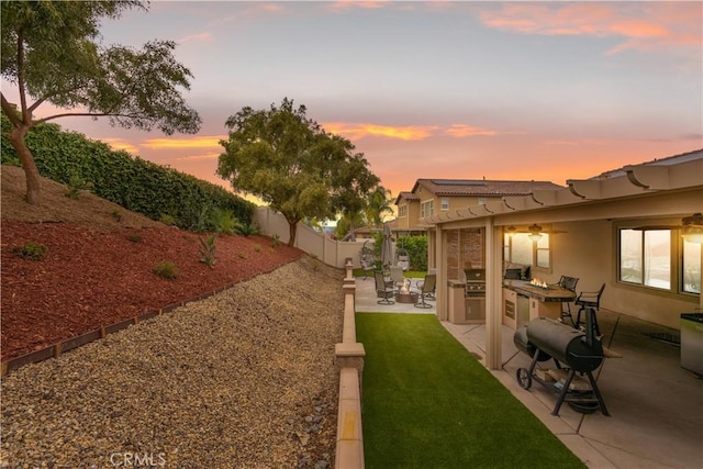32529 Presidio Hills Ln, Winchester, CA 92596 - fenced backyard with a patio and exterior kitchen
