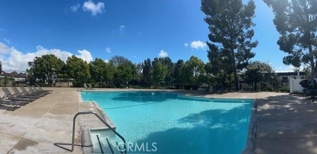 community pool featuring a patio