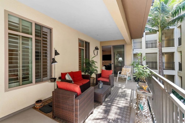 view of patio / terrace featuring an outdoor living space and a balcony