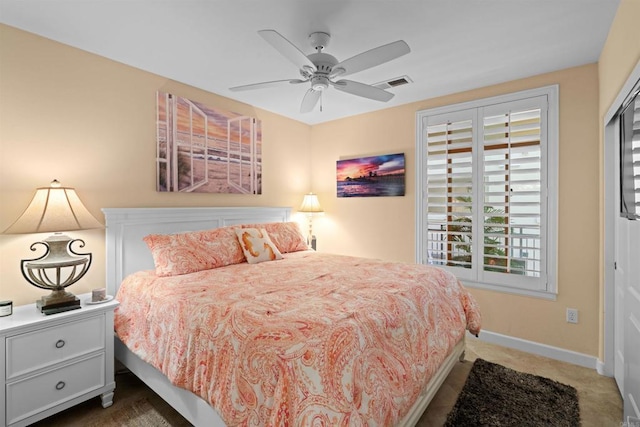 bedroom featuring carpet floors, visible vents, a ceiling fan, and baseboards