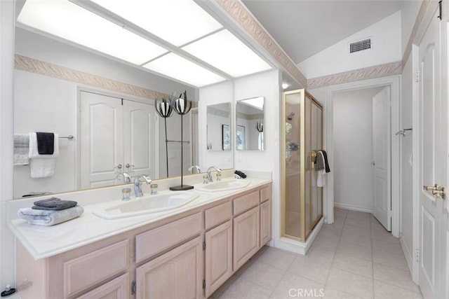 29211 Alfieri St, Laguna Niguel, CA 92677 - bathroom with a stall shower, tile patterned floors, lofted ceiling, and double vanity