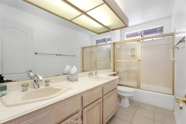 29211 Alfieri St, Laguna Niguel, CA 92677 - bathroom with tile patterned flooring, toilet, double vanity, and shower / bath combination with glass door