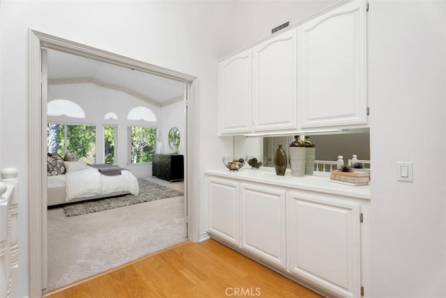 29211 Alfieri St, Laguna Niguel, CA 92677 - bar area with lofted ceiling and light wood finished floors