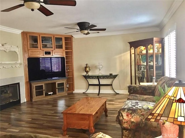 8982 Dahlia Dr, Corona, CA 92883 - living area with ornamental molding, ceiling fan, a glass covered fireplace, and wood finished floors