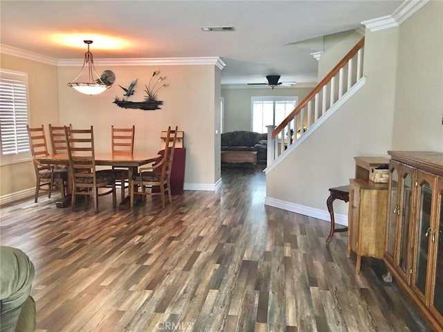 8982 Dahlia Dr, Corona, CA 92883 - dining area featuring ornamental molding, visible vents, stairway, and wood finished floors