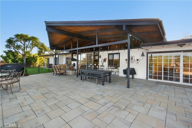 view of patio / terrace featuring fence and outdoor dining space