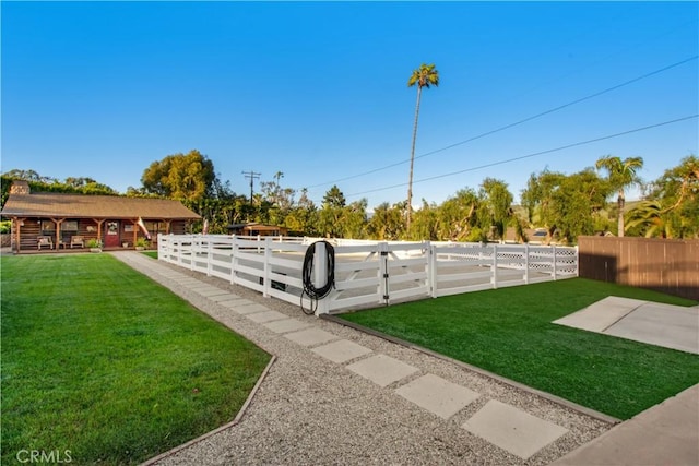 view of yard featuring fence