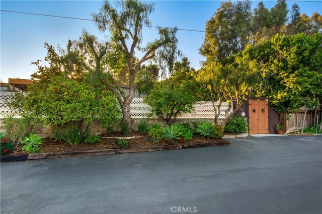 exterior space with a gate and fence