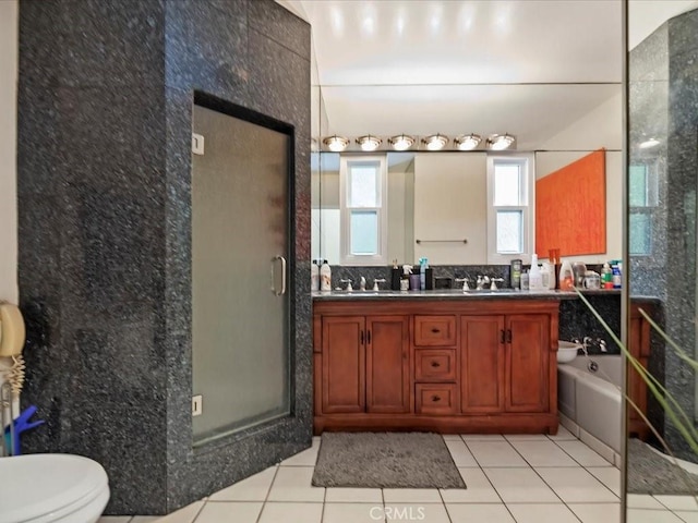 2080 Saint Louis Ave, Signal Hill, CA 90755 - full bathroom with a bath, a sink, a stall shower, double vanity, and tile patterned floors