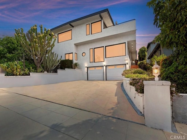 2080 Saint Louis Ave, Signal Hill, CA 90755 - contemporary home with a garage, stucco siding, and concrete driveway