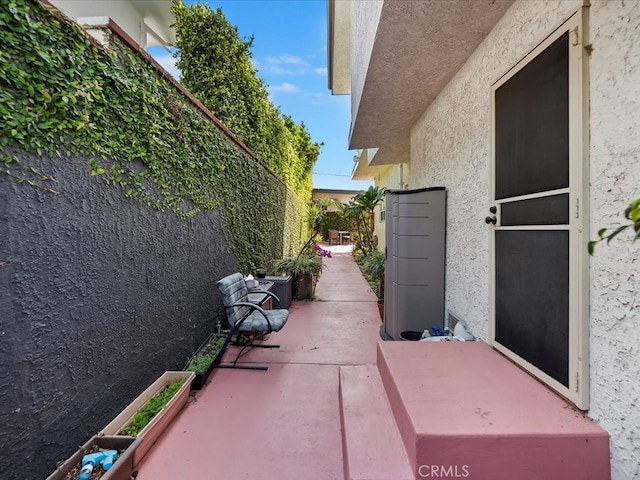 2080 Saint Louis Ave, Signal Hill, CA 90755 - view of side of property featuring a patio and stucco siding