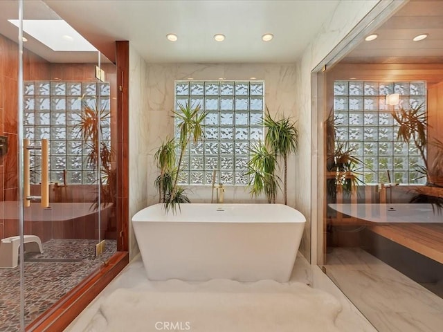2080 Saint Louis Ave, Signal Hill, CA 90755 - full bathroom featuring a freestanding bath, recessed lighting, marble finish floor, and plenty of natural light