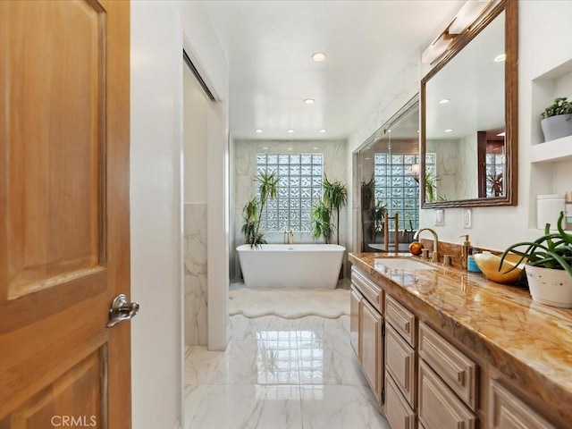 2080 Saint Louis Ave, Signal Hill, CA 90755 - bathroom with recessed lighting, a freestanding tub, vanity, and marble finish floor