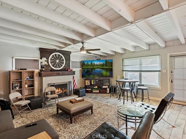2080 Saint Louis Ave, Signal Hill, CA 90755 - living room featuring wood finished floors, a fireplace, a ceiling fan, and beam ceiling