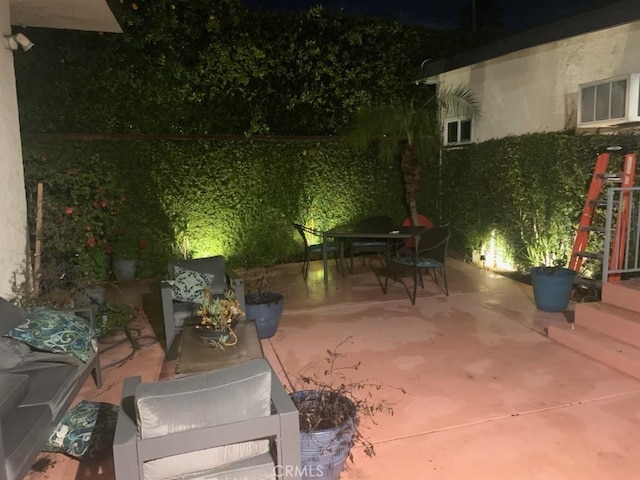 2080 Saint Louis Ave, Signal Hill, CA 90755 - patio at twilight featuring outdoor dining area