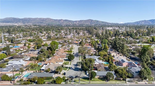 18715 Plummer St, Northridge, CA 91324 - aerial view of residential area featuring a mountainous background