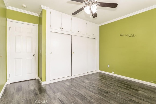 18715 Plummer St, Northridge, CA 91324 - unfurnished bedroom featuring baseboards, crown molding, dark wood-style flooring, a closet, and a ceiling fan