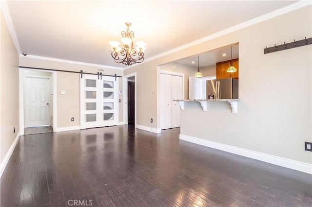 18715 Plummer St, Northridge, CA 91324 - unfurnished living room featuring a barn door, baseboards, a chandelier, and ornamental molding