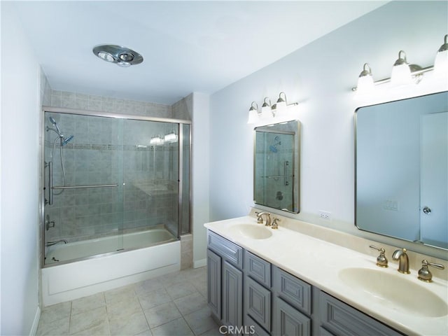 32653 Seagate Dr Unit 205, Rancho Palos Verdes, CA 90275 - bathroom with double vanity, combined bath / shower with glass door, tile patterned floors, and a sink