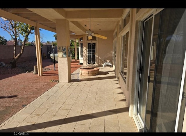 37467 Golden Pebble Ave, Palm Desert, CA 92211 - view of patio / terrace with a fenced backyard, an outdoor fire pit, and ceiling fan