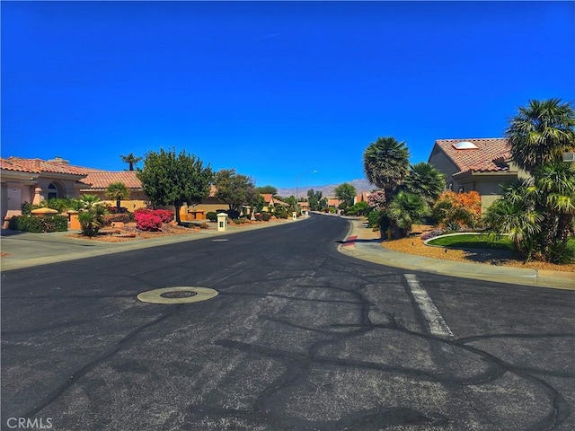 37467 Golden Pebble Ave, Palm Desert, CA 92211 - view of street with street lights and sidewalks