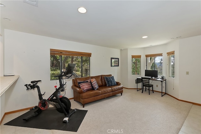 workout area with a wealth of natural light, visible vents, and recessed lighting