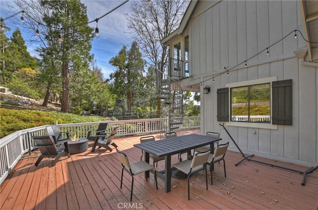 deck featuring outdoor dining area