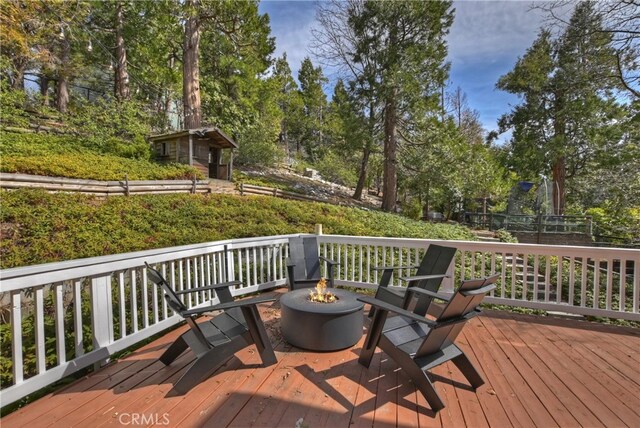 deck featuring a fire pit