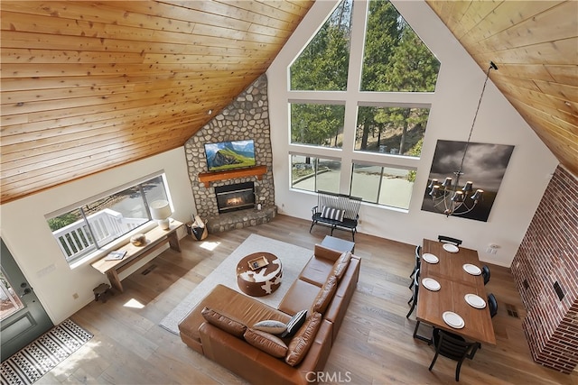 living area with plenty of natural light and wood-type flooring