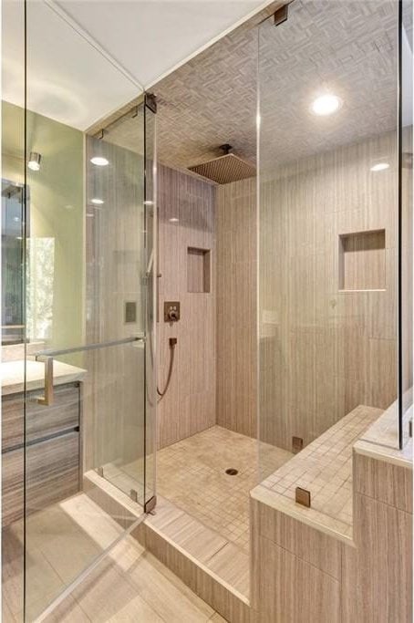 24925 Vista Verenda, Woodland Hills, CA 91367 - full bathroom featuring tile patterned flooring and a stall shower