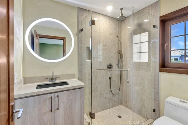 24925 Vista Verenda, Woodland Hills, CA 91367 - bathroom featuring toilet, a stall shower, and vanity