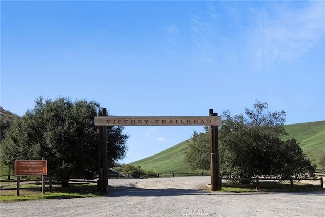 24925 Vista Verenda, Woodland Hills, CA 91367 - view of dirt / gravel road with a view of rural / pastoral area and a mountain view